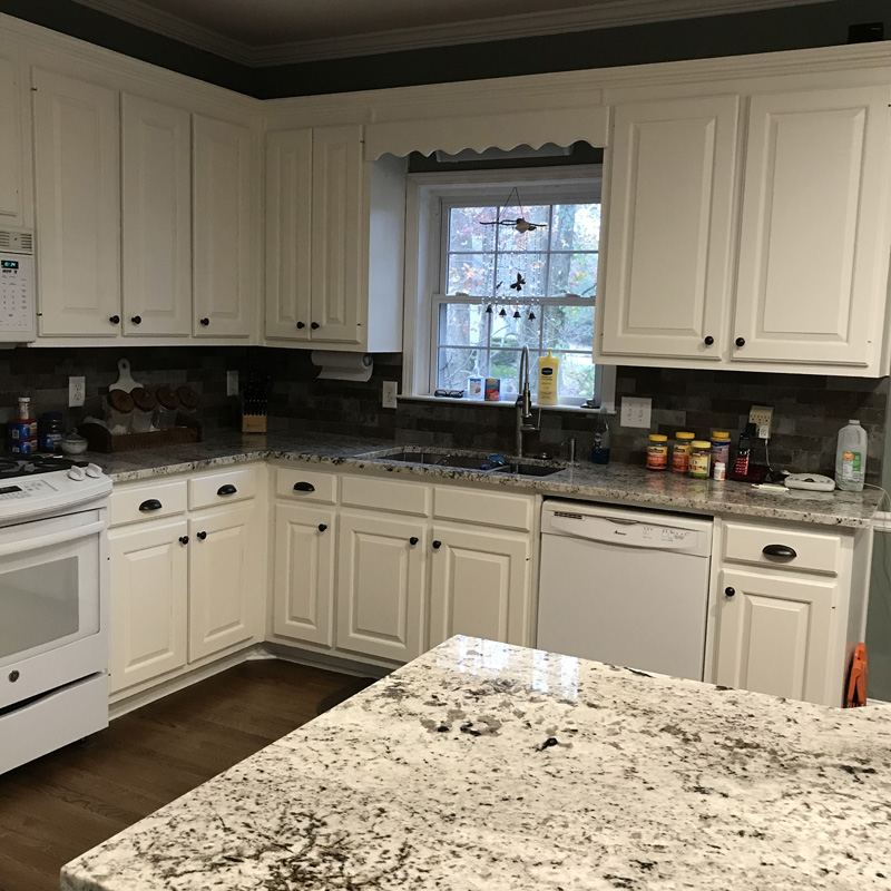 Granite countertop and painted cabinet detail
