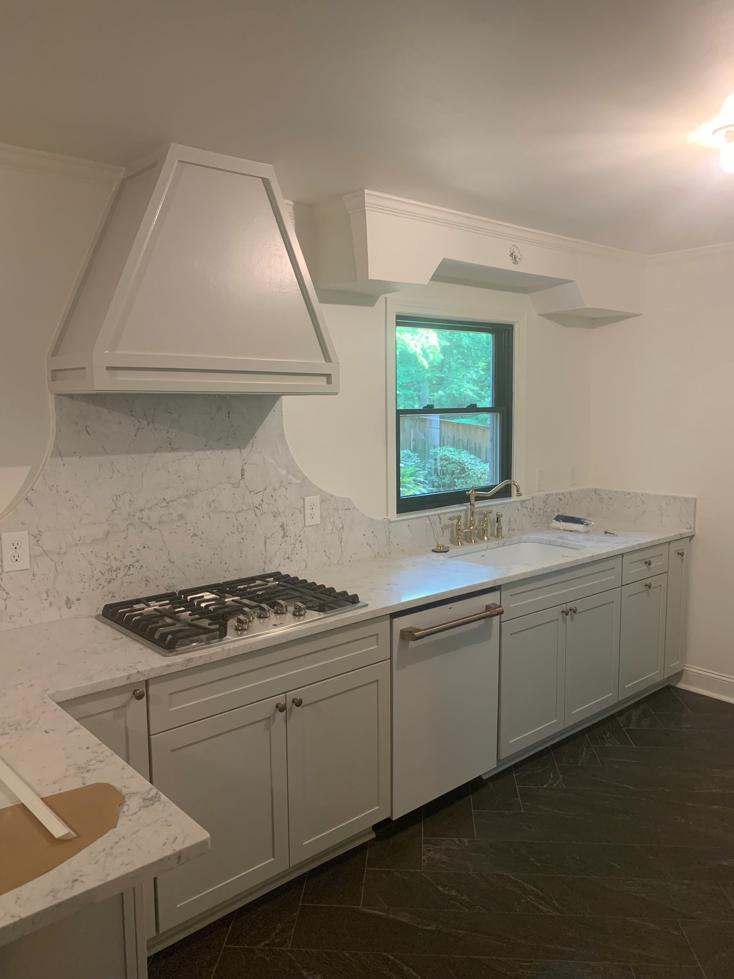 Kitchen with painted cabinets and large center island